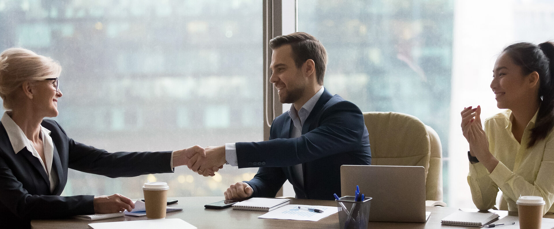 business women and man in meeting