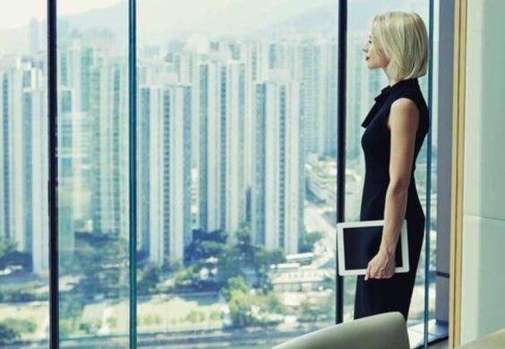business woman overlooking city