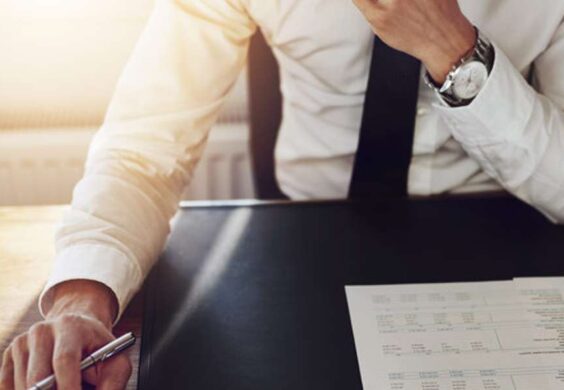 business man reviewing paperwork