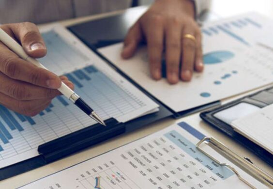 advisor reviewing financial paperwork