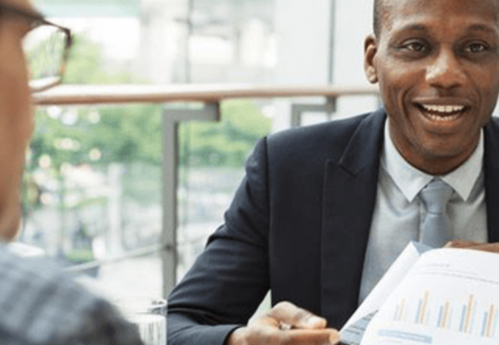 business advisor reviewing data with clients