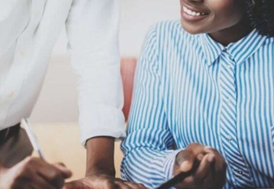 advisors reviewing paperwork