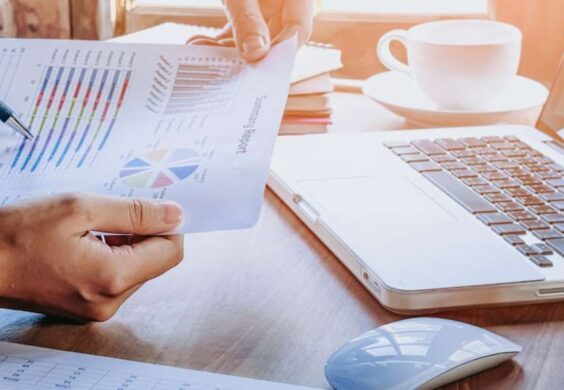 people reviewing financial paperwork