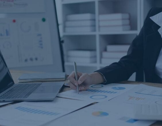 business woman reviewing data sheets