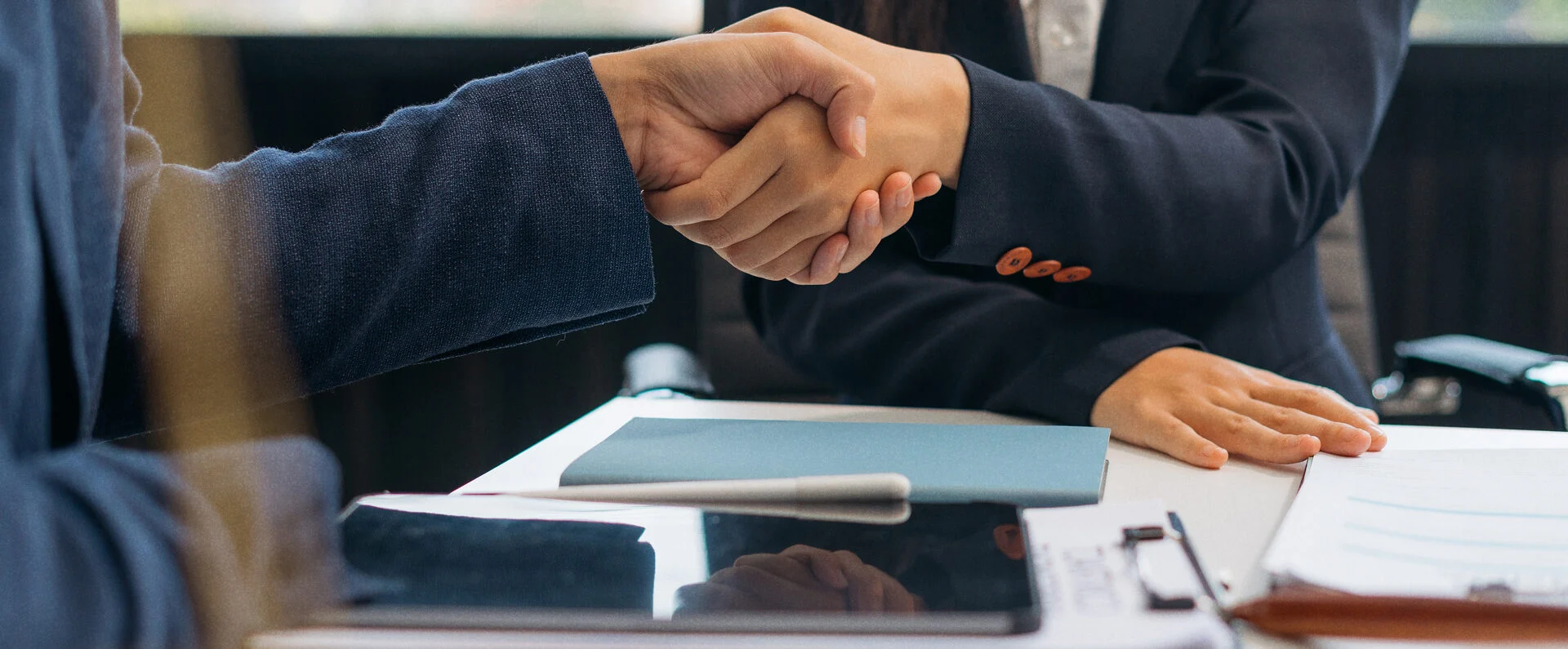 business people shaking hands
