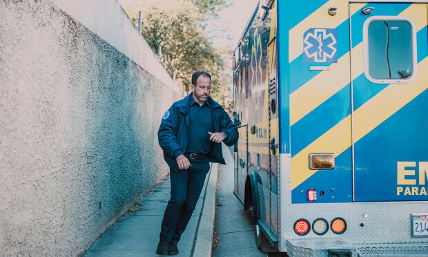 EMT worker outside ambulance