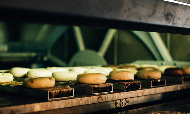 bagels baking inside commercial oven