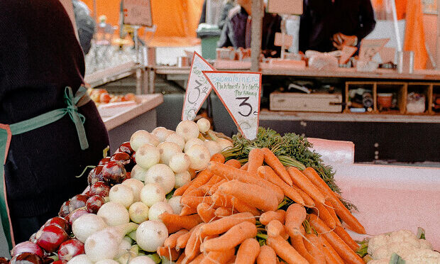 produce table at outdoor vendor market