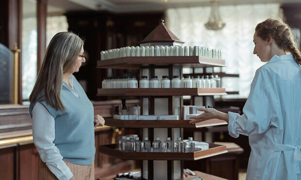 sales clerk and customer inside food supplement store