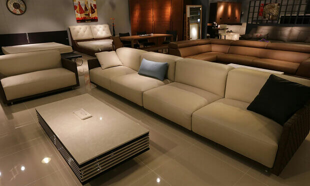 beige couch inside furniture store