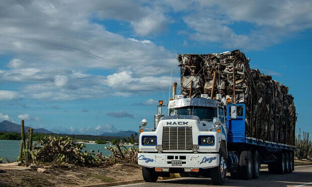 freight truck with material loaded on top