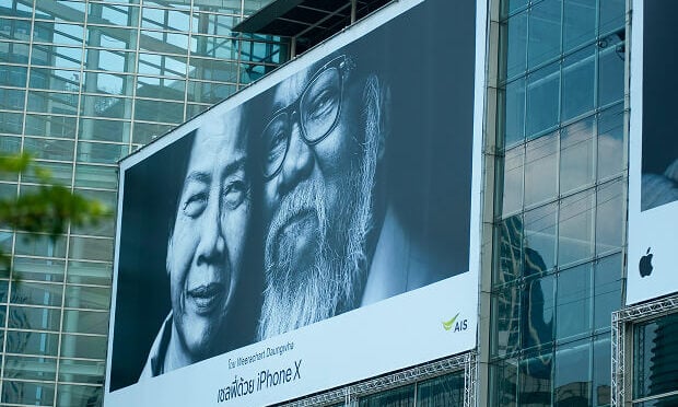 print billboard ad on glass building