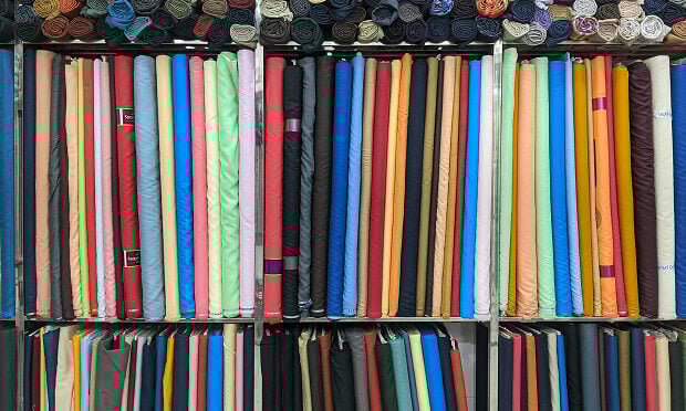 colorful linen pieces stacked next to each other