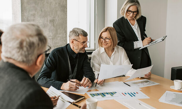 business professionals reviewing analytics