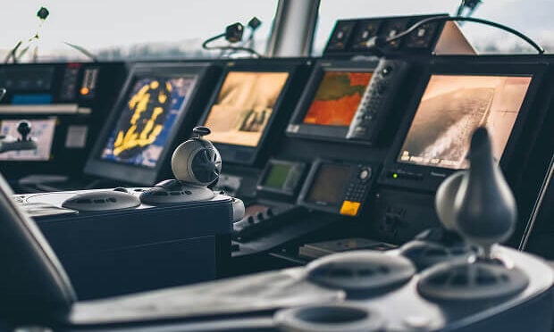 navigation controls inside of marine vessel