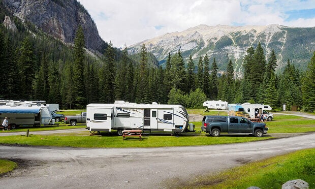rvs and trucks in camping area