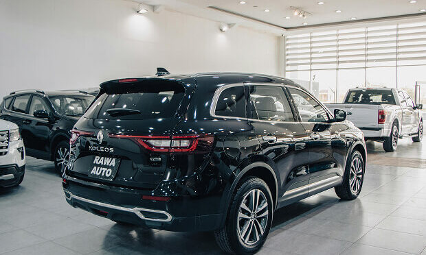 black car in a car dealership