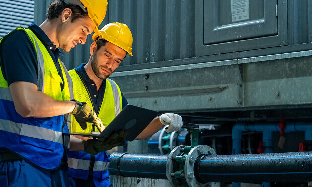 contractors reviewing laptop