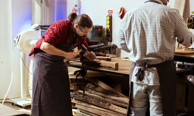 men working on prefabricated wood