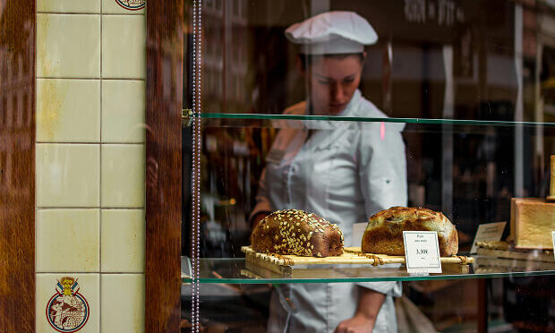 pastry chef inside of bakery