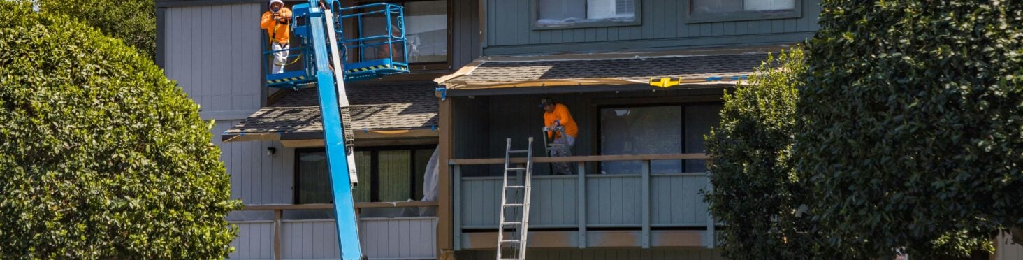 contractors adding siding to home