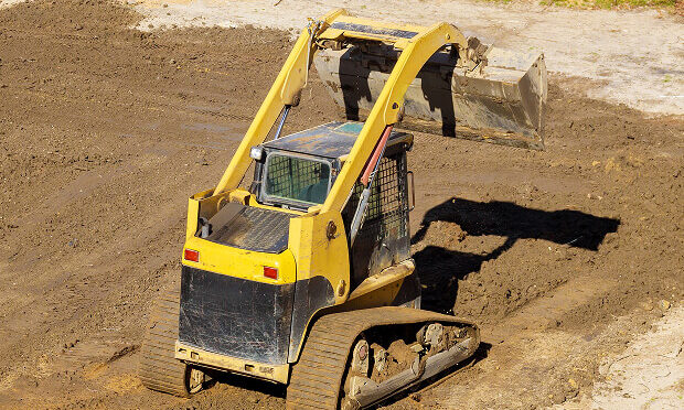 machine digging dirt