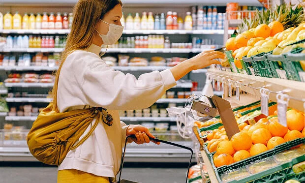 woman shopping for produce