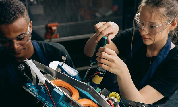 woman using screwdriver