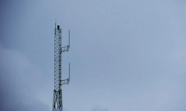 communication tower covered in the wind