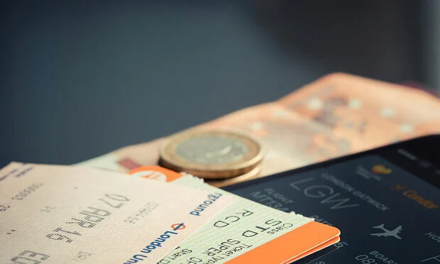london flight ticket and currency