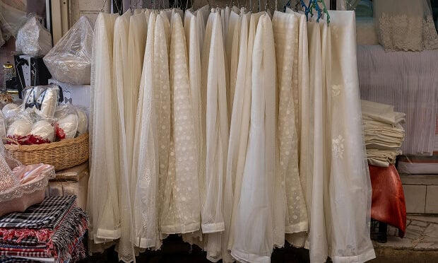 white curtains hanging on a rack
